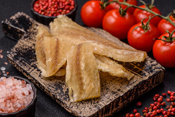 Dried salted fish, snacks or jerky, slices of white fish fillets