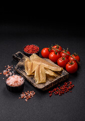 Dried salted fish, snacks or jerky, slices of white fish fillets
