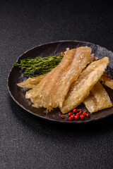 Dried salted fish, snacks or jerky, slices of white fish fillets