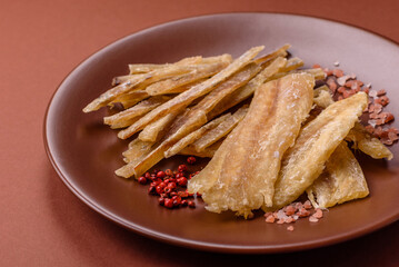 Dried salted fish, snacks or jerky, slices of white fish fillets