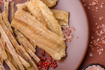 Dried salted fish, snacks or jerky, slices of white fish fillets