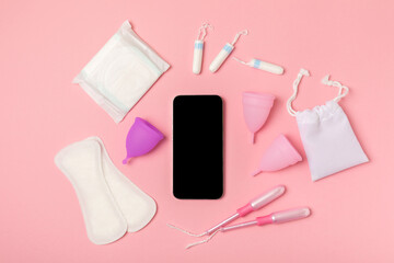 Menstrual cup on a bright background. Sanitary napkins, tampons and menstrual cup.Concept of critical days, menstruation.feminine hygiene product. Women health concept.Premenstrual syndrome.Copy space