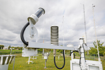 Close-up of weather station sensors and instruments used for collecting atmospheric data outdoors