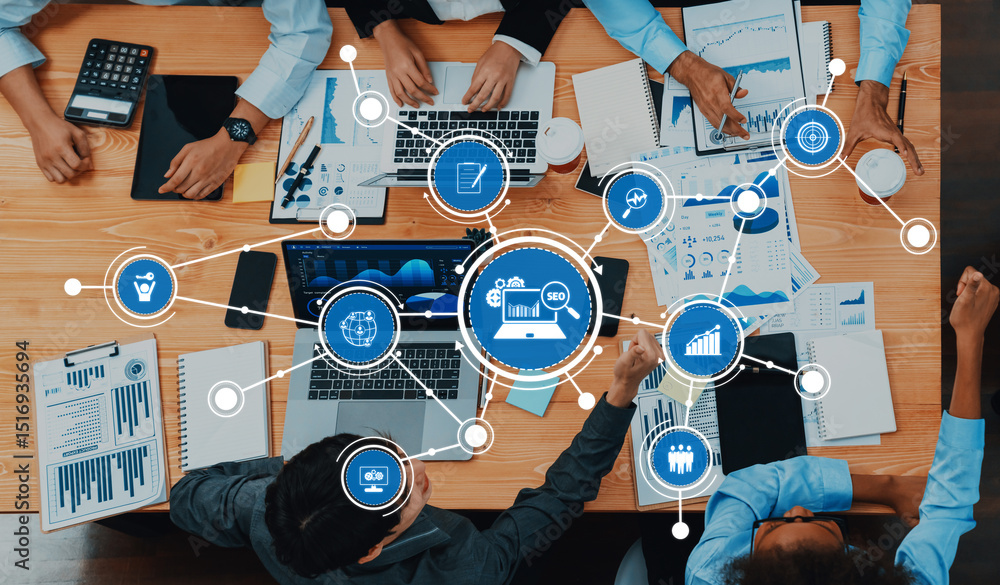 Poster a dynamic business meeting showcasing a diverse team analyzing digital marketing data displayed on a