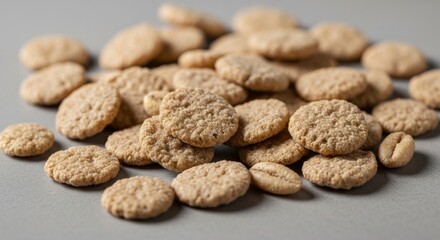 Close-up of crunchy whole wheat cereal on gray surface