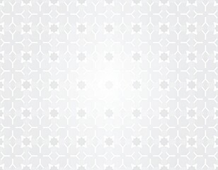 Repeating white geometric pattern on light gray