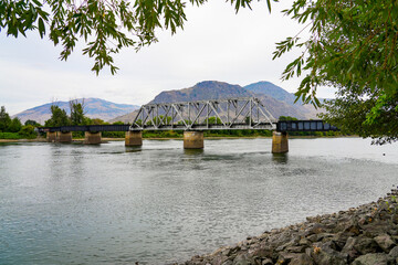 Railway bridge crossing the South Thompson River in Kamloops, British Columbia, Canada