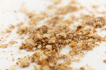 This inviting close-up captures a pile of fresh walnut halves and pieces, exuding a sense of natural goodness and healthy indulgence. Perfect for baking, healthy snacking, or superfood content