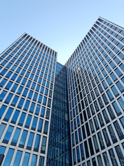 Modern Skyscrapers with Glass Facades Viewed from Below