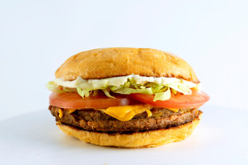A catalog of burgers in different varieties with potato buns, meat and vegan medallions with lettuce, tomato, bacon, cucumbers, cheddar cheese, and American-style caramelized onions.