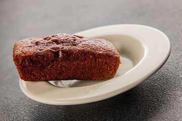 Financier biscuit chocolate cookie sweet dessert fresh delicious gourmet food background on the table rustic food top view copy space