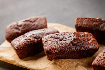 Financier biscuit chocolate cookie sweet dessert fresh delicious gourmet food background on the table rustic food top view copy space