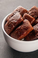 Financier biscuit chocolate cookie sweet dessert fresh delicious gourmet food background on the table rustic food top view copy space