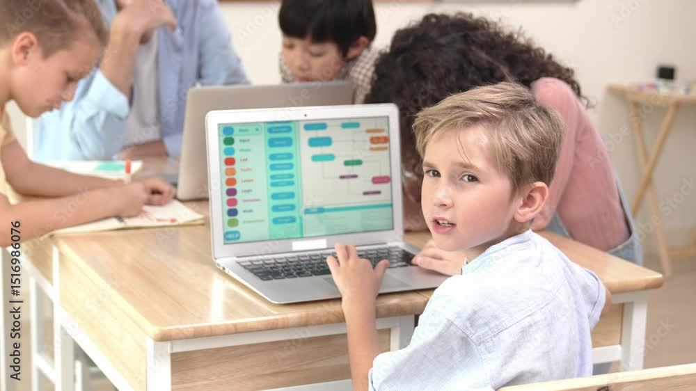 Poster smart caucasian boy turn around and looking at camera in stem technology class while group of divers