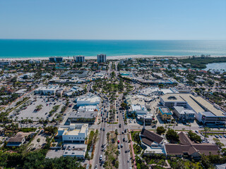 Beautiful aerial view of Sarasota, the magnificent white sand beach, and its iconic St. Armands Circle