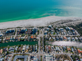 Beautiful aerial view of Sarasota, the magnificent white sand beach, and its iconic St. Armands Circle