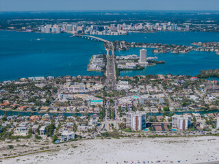 Beautiful aerial view of Sarasota, the magnificent white sand beach, and its iconic St. Armands Circle