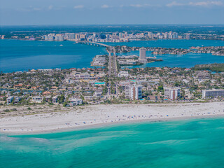 Beautiful aerial view of Sarasota, the magnificent white sand beach, and its iconic St. Armands Circle