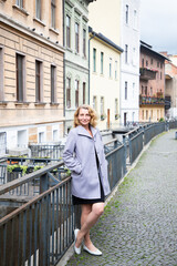 happy woman strolling in the city