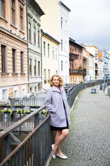 happy woman strolling in the city