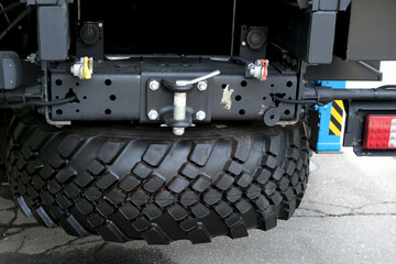 Spare tire of truck. New car, cargo transport, suspension option for spare tire attachment