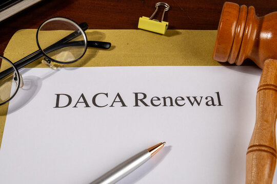 DACA Renewal Document with Gavel and Pen &ndash; Immigration Policy and Legal Protection Concept