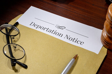 Deportation Notice Document with Gavel and Pen on Desk – Immigration Law and Removal Order Concept