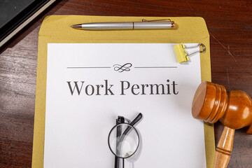 Work Permit Document on Desk Beside Gavel – Immigration Law Theme