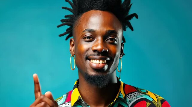 Stylish Individual: A striking individual with distinct dreadlocks and a vibrant patterned shirt smiles, radiating confidence and personality.