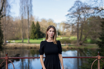 young woman on a bridge