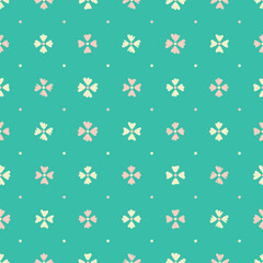 Flower polka dot tiled motif pattern. Doodle floral seamless background vector in pink and yellow over green.