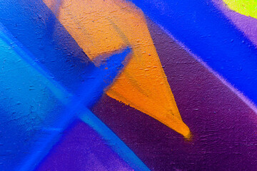 beautiful bright street aerosol graffiti background. City wall pattern decorated with colorful spray drawing