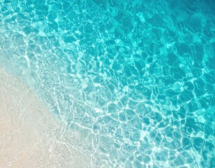 Turquoise water meets sandy shore