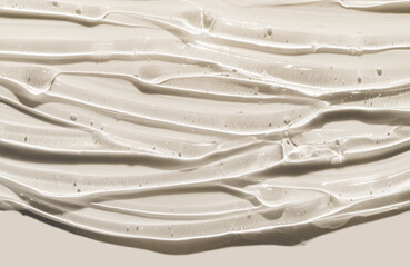 Cosmetic beige liquid serum or acid peeling or aloe gel textured background swatch sample background