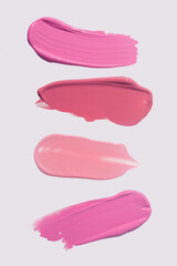 Lipstick or creamy stick blusher thick matte texture palette set on light grey background