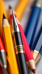 group of different colored pencils sitting next to each other