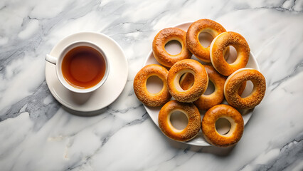Tea Cup and Bagels on Marble