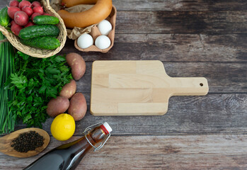 Ingredients for preparing tasty okroshka on stylish background