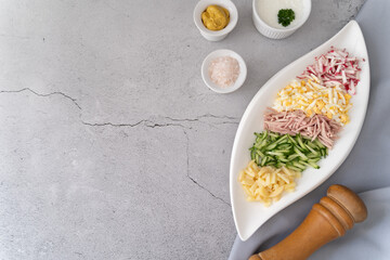 Prepared ingredients ready to be mixed in okroshka