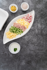 Prepared ingredients ready to be mixed in okroshka