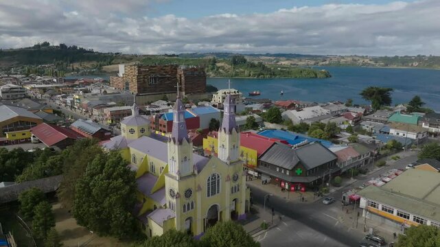 Aerial view Iconic Yellow Church of San Francisco, Castro Chiloe