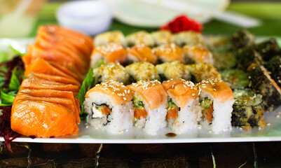 sushi set of fresh salmon, philadelphia springroll, salmon slices