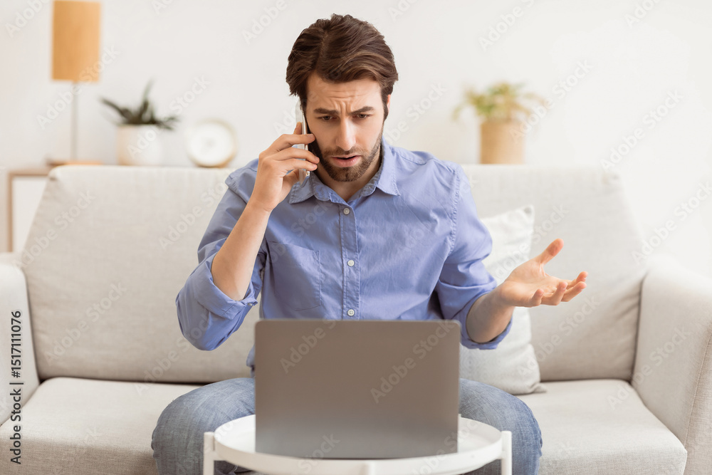 Poster displeased guy talking on cellphone using laptop, having computer problem sitting on sofa at home. d