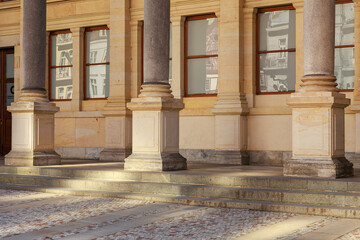 Classical architecture with stone columns and glass windows