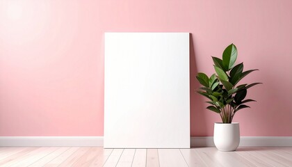 White poster mockup standing on the floor near pink wall.