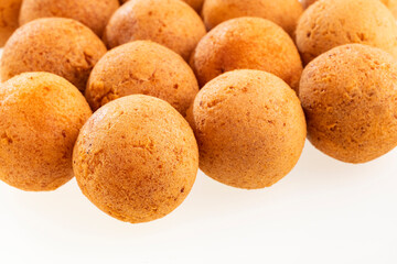 Delicious typical Colombian buñuelos - round, fried with cheese