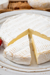 French soft cheeses collection, creamy cow's milk cheese brie with white mold, France