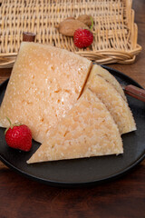 Very old anejo tostado Spanish hard cheese, cow and sheep curado, manchego, goat cheese close up