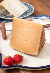 Very old anejo tostado Spanish hard cheese, cow and sheep curado, manchego, goat cheese close up