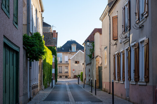 Fototapeta Narrow streets and old houses in grand cru champagne village Ay-Champagne in Marne river valley, France